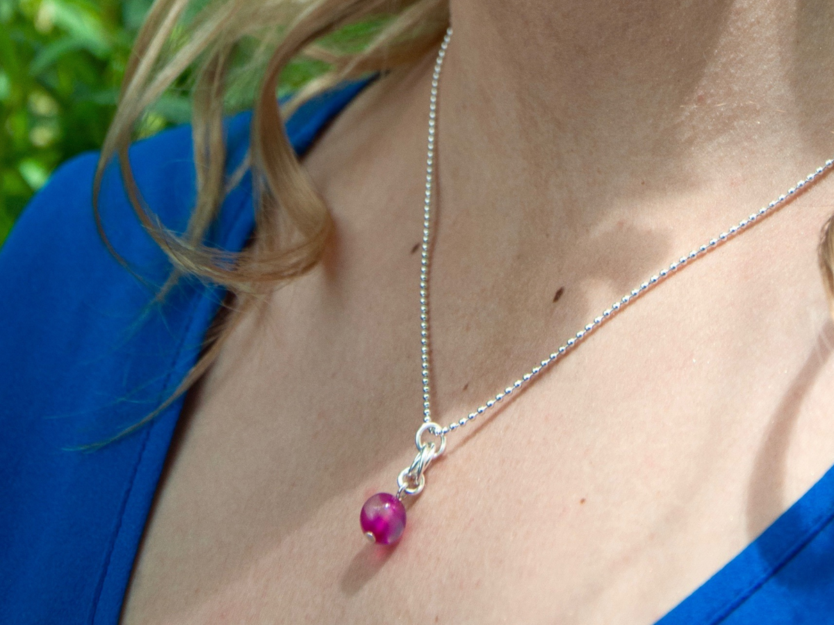 collier pendentif perle rose